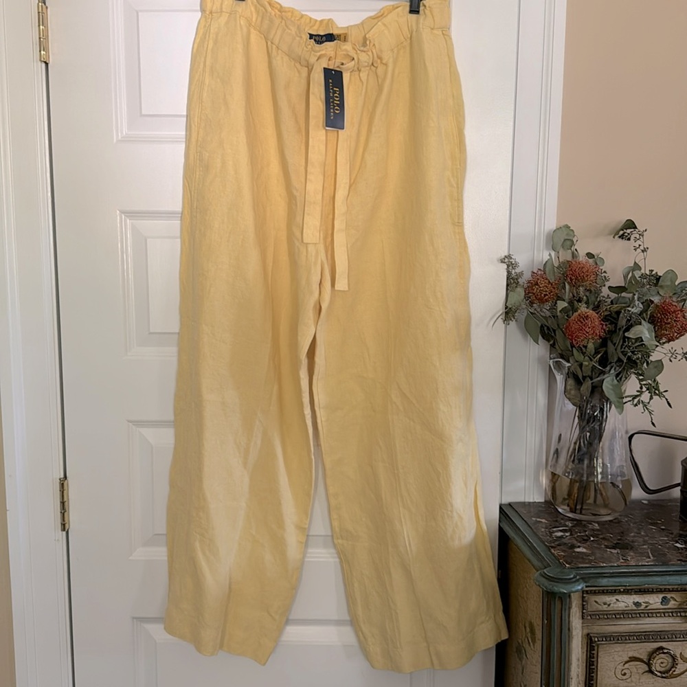 New with tags. Ralph Lauren linen yellow pants.  L.  They are on the big side.